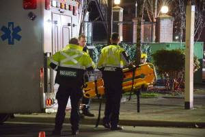 Paramedics ready a stretcher at the scene of a two-vehicle crash at Fraser Highway and 201A Street in November 2023. (Matthew Claxton/Langley Advance Times)
