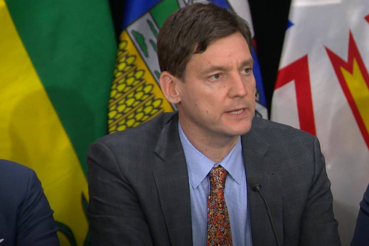 B . C . premier says extortion crisis is a  terror attack in slow motion  