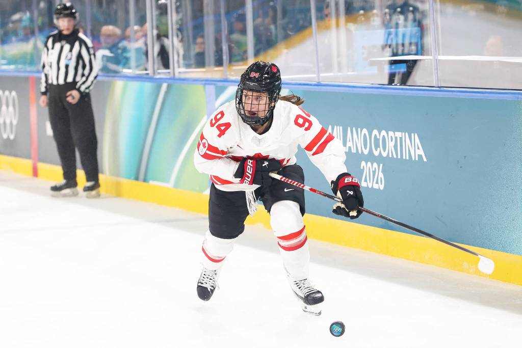 Team Canada&rsquo;s Jenn Gardiner competes against Switzerland at the 2026 winter games. Gardiner scored her first Olympic goal, the game winner, against Finland Feb. 12 in a 5-0 victory. (Photo: Daniel Lea/Contributed to the Cloverdale Reporter)